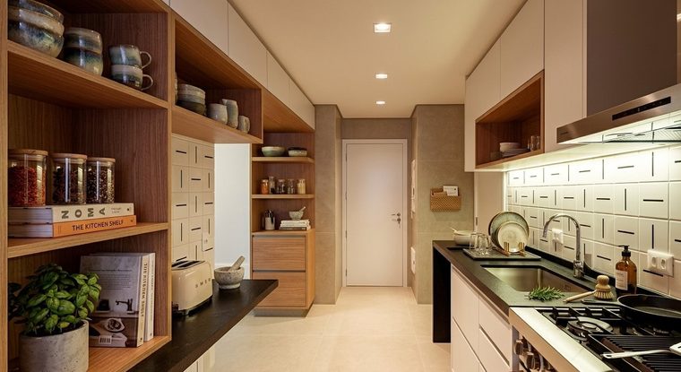 Cozinha de apartamento com marcenaria sob medida, bancada preta e revestimento artesanal